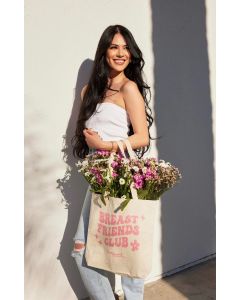 Image of Hollywood Fashion Secrets Breast Friends Canvas Tote front facing with printed Breast Friends Club graphic on model's arm
